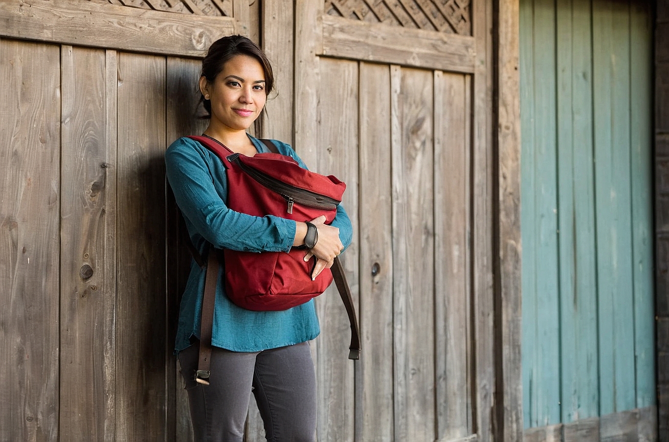 Lady holding backpack